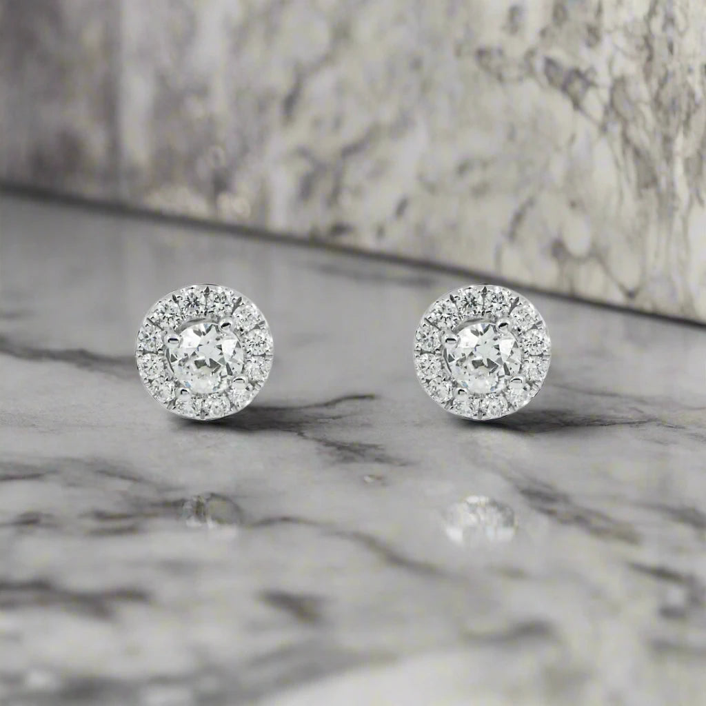 Fold knot earrings-Vashti 1 Carat Round Halo Diamond Stud Earrings in 18K White Gold