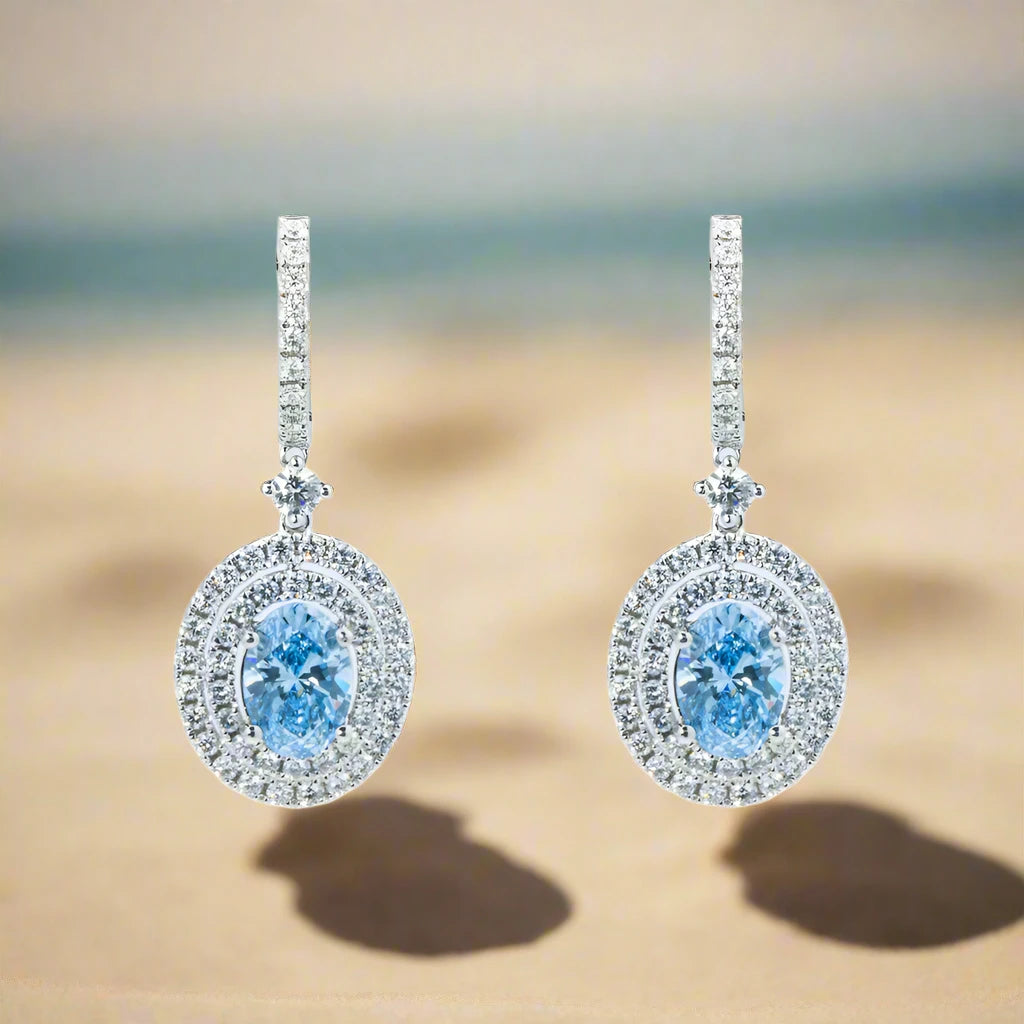 Bloom hoop earrings-Yareli 3 Carats Oval Cut Lab Grown Fancy Vivid Blue Diamond Drop Earrings in 18K White Gold