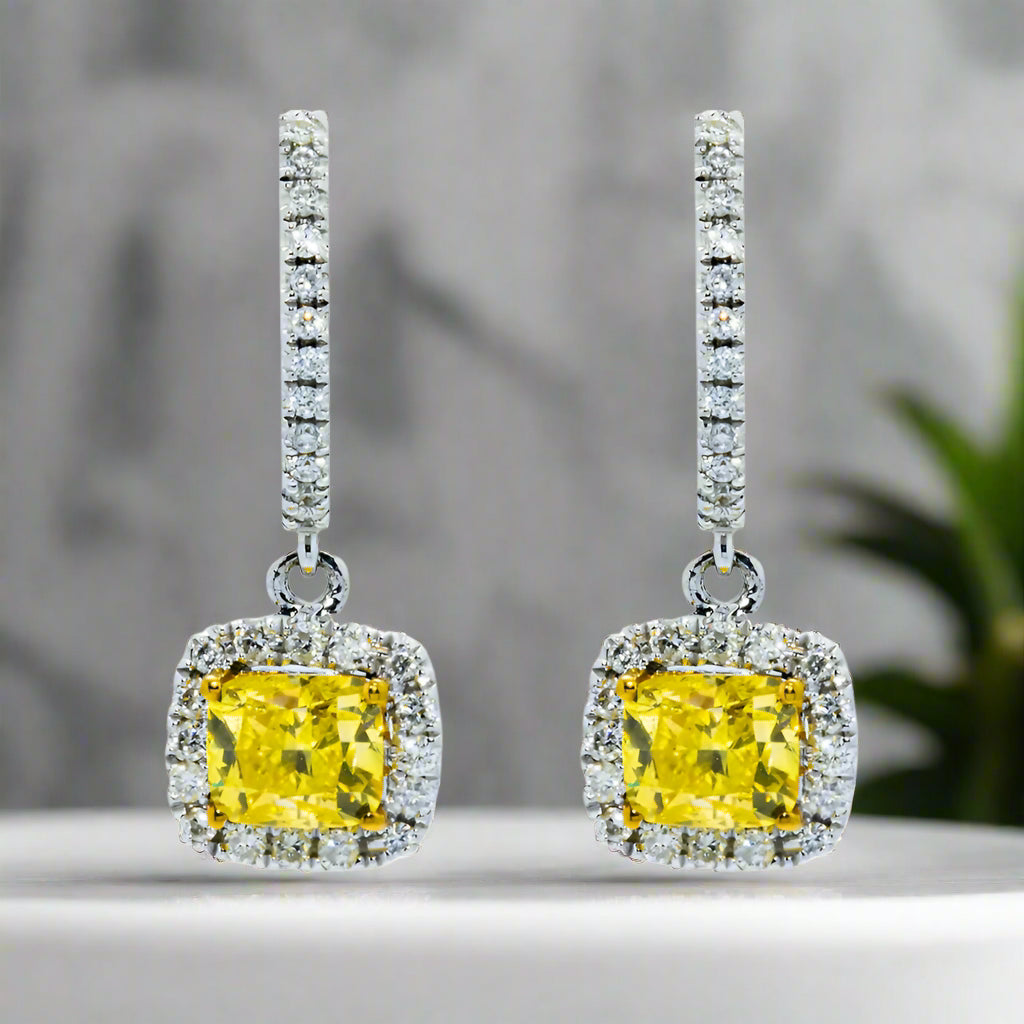 Dull brass earrings-Meris 1 Carat Cushion Cut Fancy Yellow Diamond Drop Earrings in 18K White Gold