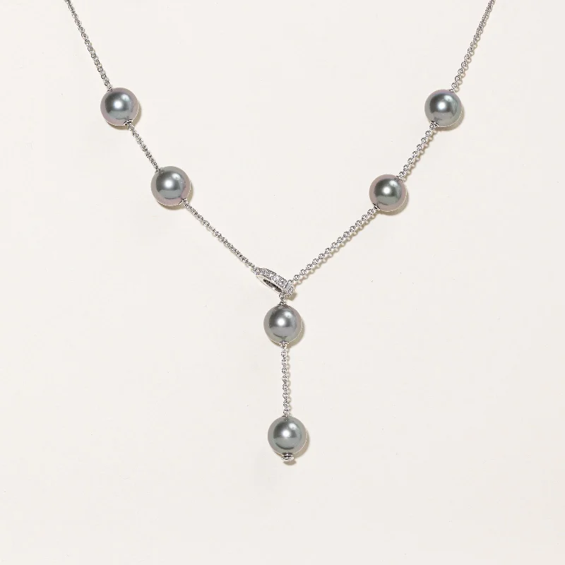 Retro photo necklaces-'Mikimoto' Pearls in Motion Black South Sea Pearl and Diamond Necklace | 10.5mm, 0.20ctw |