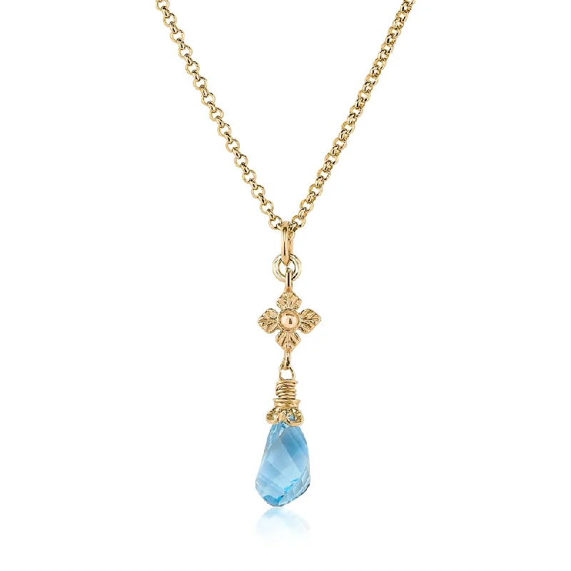 Peace eye necklaces-Faceted Blue Topaz Twist Necklace with Flower Detail in Gold