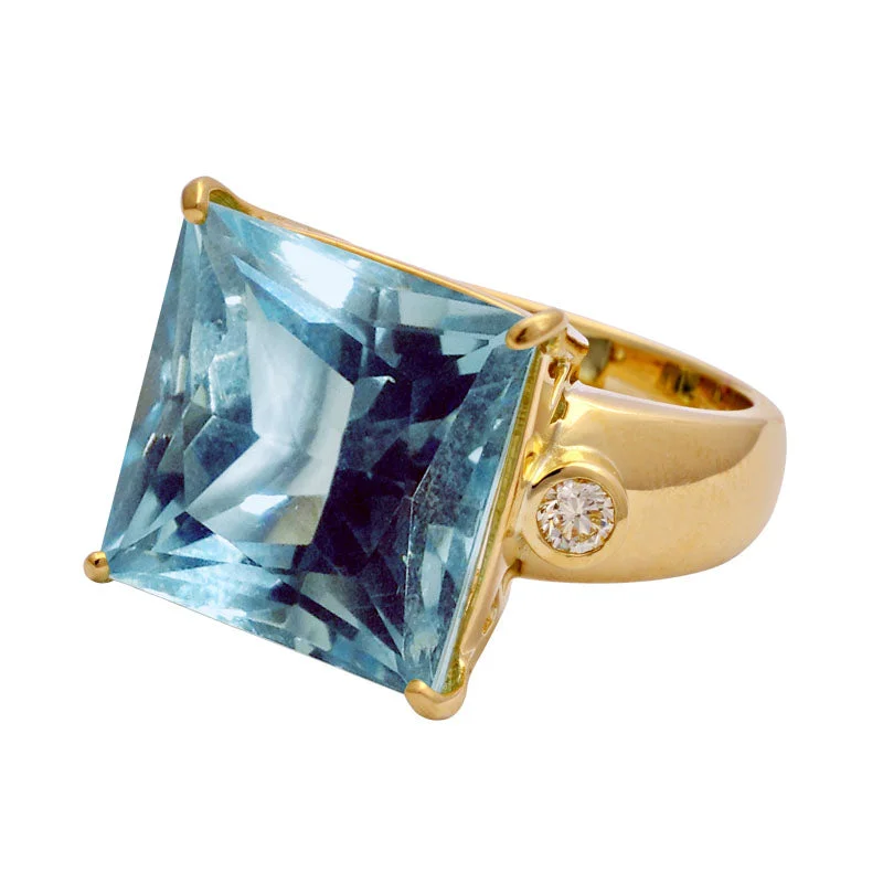 RING- BLUE TOPAZ AND DIAMOND